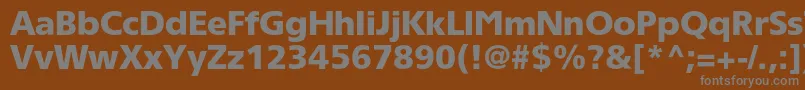 Tornadoblackc-fontti – harmaat kirjasimet ruskealla taustalla