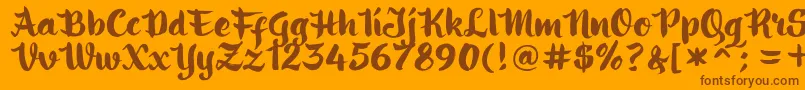 ringotube script-Schriftart – Braune Schriften auf orangefarbenem Hintergrund