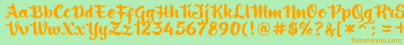 Czcionka ringotube script – pomarańczowe czcionki na zielonym tle