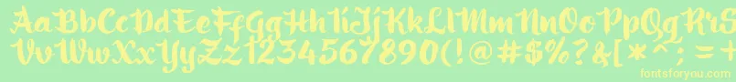 フォントringotube script – 黄色の文字が緑の背景にあります