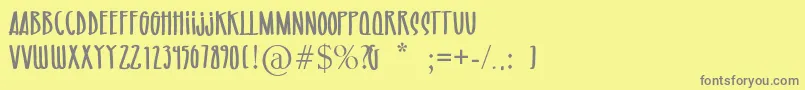 フォントRIO  MA – 黄色の背景に灰色の文字