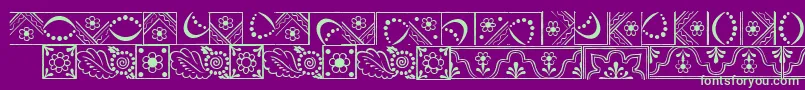 フォントDalaLtBorders – 紫の背景に緑のフォント