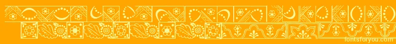 Czcionka DalaLtBorders – żółte czcionki na pomarańczowym tle