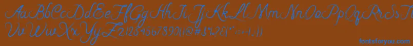 Riska Script Font – Blue Fonts on Brown Background