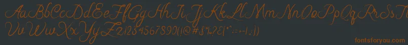 フォントRiska Script – 黒い背景に茶色のフォント