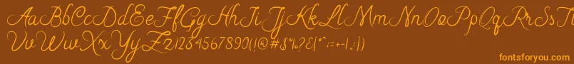 Czcionka Riska Script – pomarańczowe czcionki na brązowym tle
