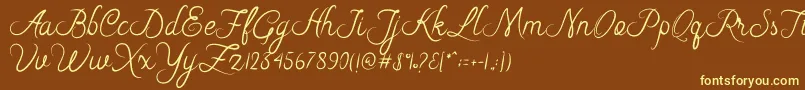 Riska Script Font – Yellow Fonts on Brown Background