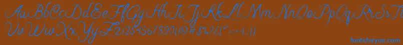 Riska Script Font – Blue Fonts on Brown Background