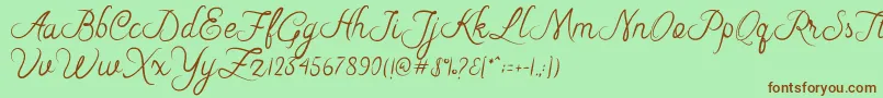 fuente Riska Script – Fuentes Marrones Sobre Fondo Verde