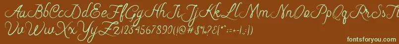 フォントRiska Script – 緑色の文字が茶色の背景にあります。