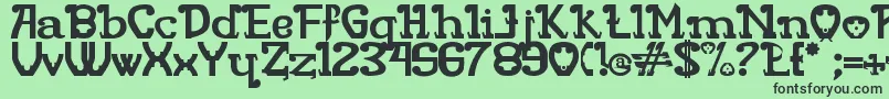 フォントRita Mouse – 緑の背景に黒い文字