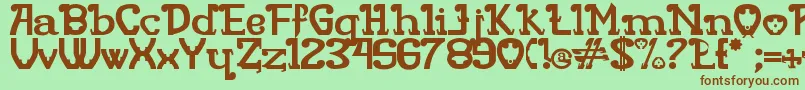 Rita Mouse-fontti – ruskeat fontit vihreällä taustalla