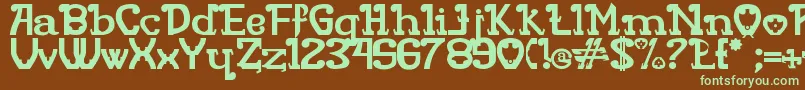 フォントRita Mouse – 緑色の文字が茶色の背景にあります。
