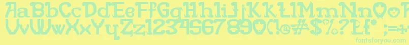 フォントRita Mouse – 黄色い背景に緑の文字