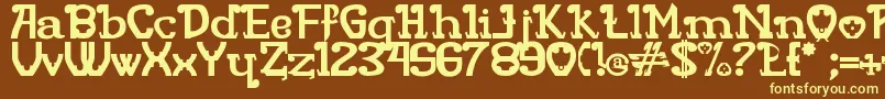 Rita Mouse-fontti – keltaiset fontit ruskealla taustalla