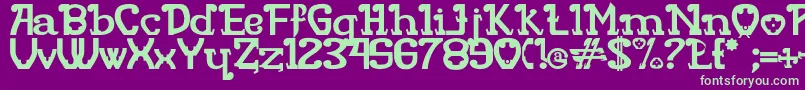 フォントRITAMOUS – 紫の背景に緑のフォント