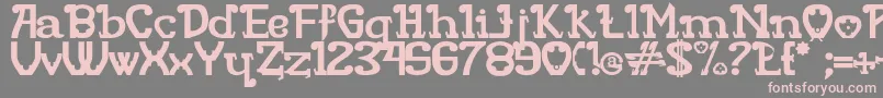 フォントRITAMOUS – 灰色の背景にピンクのフォント