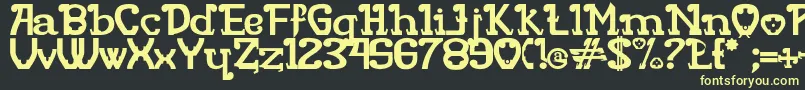 RITAMOUS Font – Yellow Fonts on Black Background