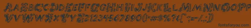 フォントChorizoItalic – 黒い文字が茶色の背景にあります