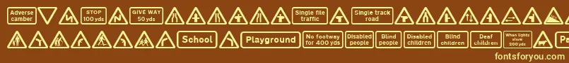 Road Caution Signs Part 1-fontti – keltaiset fontit ruskealla taustalla