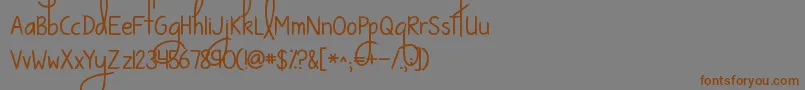 フォントKgwaystosaygoodbye – 茶色の文字が灰色の背景にあります。