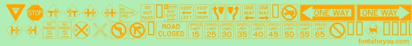 ROADSIGN Font – Orange Fonts on Green Background