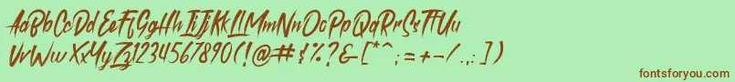Шрифт roastink demo – коричневые шрифты на зелёном фоне