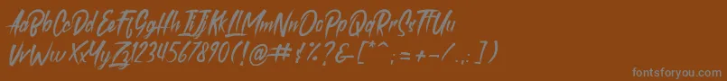 Шрифт roastink demo – серые шрифты на коричневом фоне