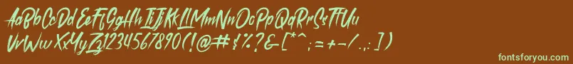 フォントroastink demo – 緑色の文字が茶色の背景にあります。