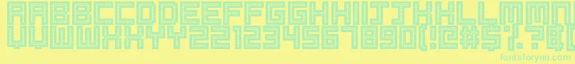 Robotic Harlequin Font – Green Fonts on Yellow Background