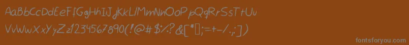 Шрифт Rocchy  s handwriting – серые шрифты на коричневом фоне