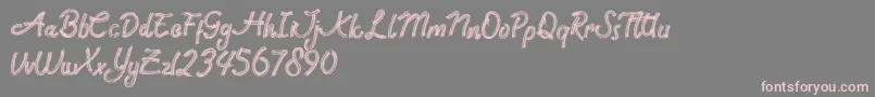 Rock Brush Pro-Schriftart – Rosa Schriften auf grauem Hintergrund