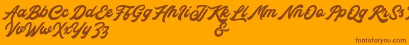 Rocka  Billy Demo Version-Schriftart – Braune Schriften auf orangefarbenem Hintergrund