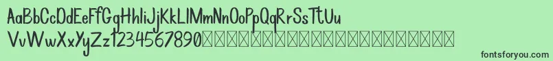 Rockbrush DEMO-Schriftart – Schwarze Schriften auf grünem Hintergrund
