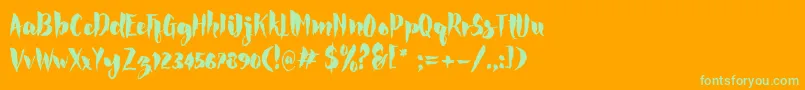 Rocke-Schriftart – Grüne Schriften auf orangefarbenem Hintergrund