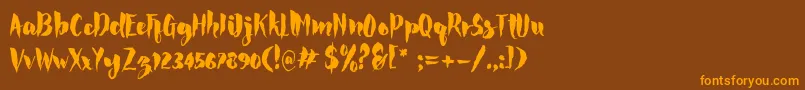 Rockeフォントについての詳細 フォントRocke – オレンジ色の文字が茶色の背景にあります。