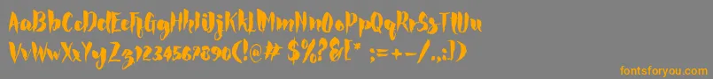 Rocke Font – Orange Fonts on Gray Background