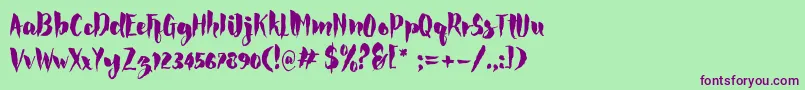 Rocke Font – Purple Fonts on Green Background