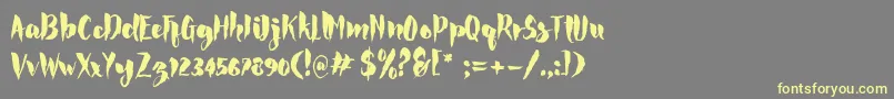 Rocke Font – Yellow Fonts on Gray Background