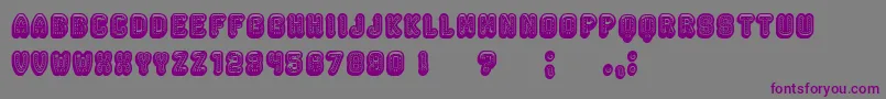Rockefeller3DFancy-fontti – violetit fontit harmaalla taustalla