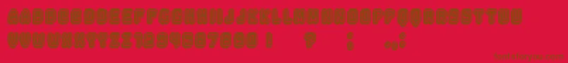 Fonte Rockefeller3DFlat – fontes marrons em um fundo vermelho