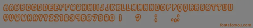 Rockefeller3DHollow Font – Brown Fonts on Gray Background