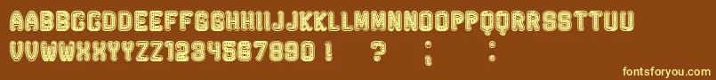 RockefellerFancy Font – Yellow Fonts on Brown Background