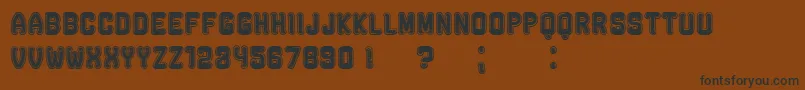 RockefellerFancyFlat Font – Black Fonts on Brown Background