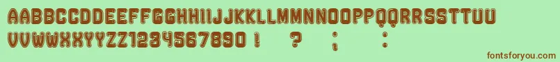 RockefellerFancyFlat Font – Brown Fonts on Green Background