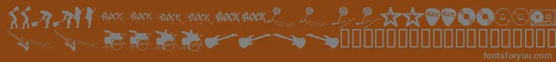 fuente ROCKS    – Fuentes Grises Sobre Fondo Marrón