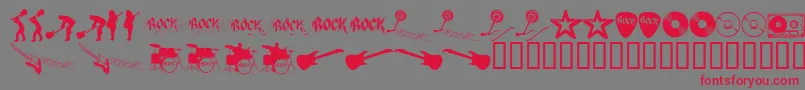 ROCKS   -fontti – punaiset fontit harmaalla taustalla