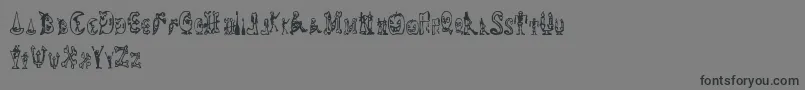HalloweenHappy-Schriftart – Schwarze Schriften auf grauem Hintergrund