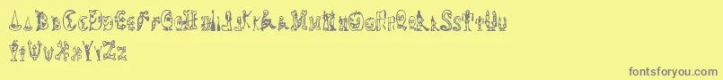 HalloweenHappy-Schriftart – Graue Schriften auf gelbem Hintergrund