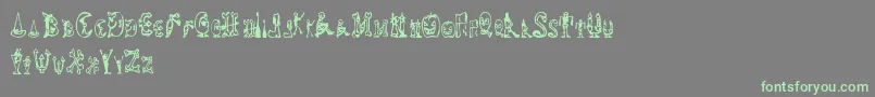 HalloweenHappy-Schriftart – Grüne Schriften auf grauem Hintergrund
